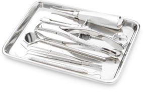 Dental tools and equipment on white background